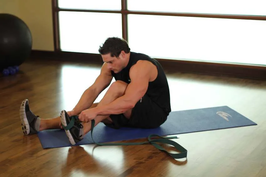 Seated Hamstring And Calf Stretch Seated Hamstring And Calf Stretch