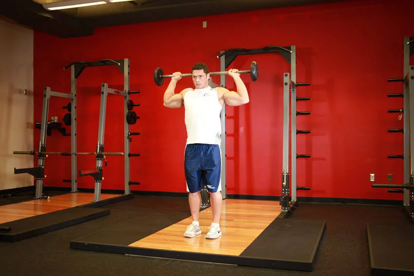Standing Barbell Press Behind Neck Standing Barbell Press Behind Neck