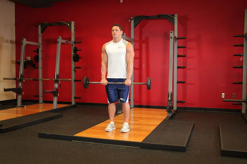 Standing Front Barbell Raise Over Head Standing Front Barbell Raise Over Head