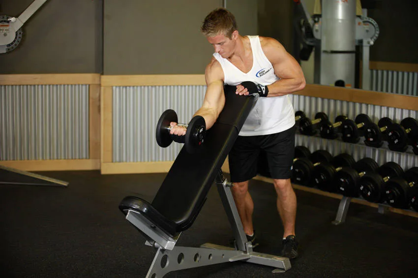 Standing One-Arm Dumbbell Curl Over Incline Bench Standing One-Arm Dumbbell Curl Over Incline Bench
